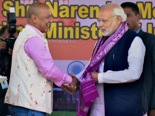 Prime Miniister Narendra Modi with the Chief of Bodoland Peoples’ Front (BPF) Hagrama Mohilary at a public meetingin Kokrajhar, Assam. Credit:: PTI