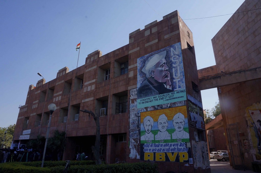 The national flag flies on top of a building in JNU, and has done so for years, spawning under the principles it represents a culture on campus where civilised debate and dissent has flowered. Credit: Shome Basu