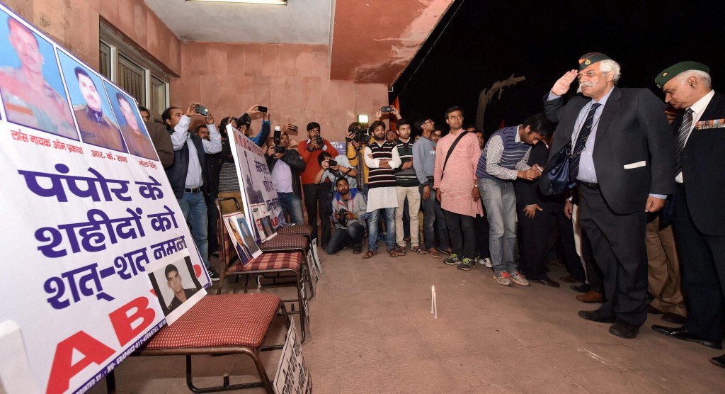 Ex-servicemen and students pay homage to soldiers of the Indian Army and victims of the Parliament attack at a meeting organised by ABVP on the JNU campus in New Delhi on Wednesday. Credit: PTI Photo by Vijay Verma