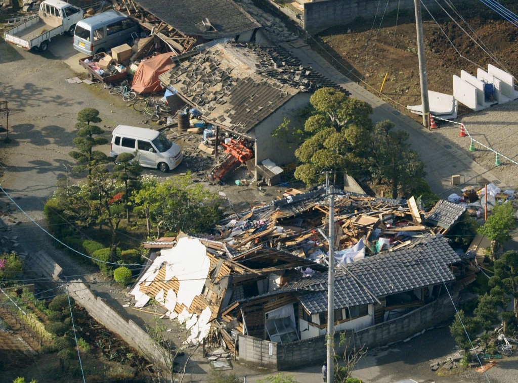 Collapsed houses caused by an earthquake are seen in Mashiki town, Kumamoto prefecture, southern Japan, in this photo taken by Kyodo April 15, 2016. Credit: Reuters/Kyodo