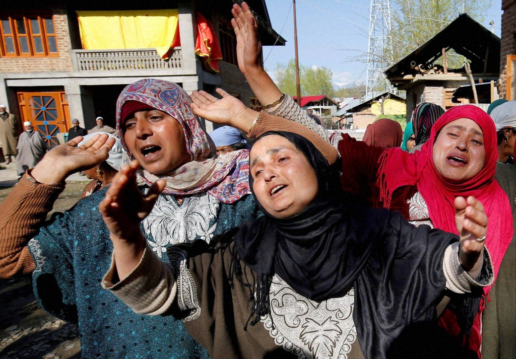 Relatives mourn after the death of civilians in firing by security forces in Handwara. Credit: PTI