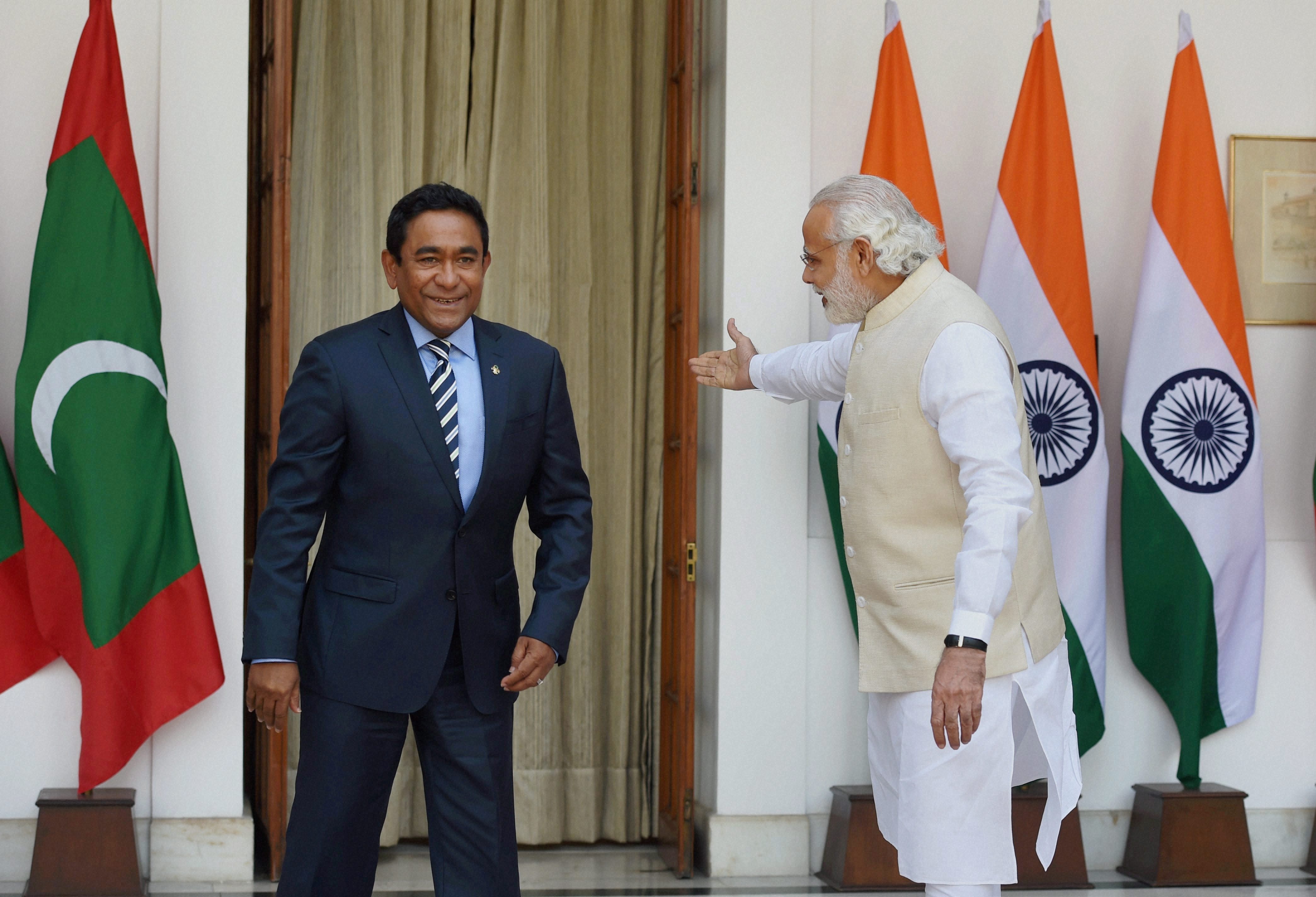 Prime Minister Narendra Modi with President Abdulla Yameen Abdul Gayoom of the Maldives during their meeting at Hyderabad house in New Delhi on Monday. Credit: PTI/Subhav Shukla