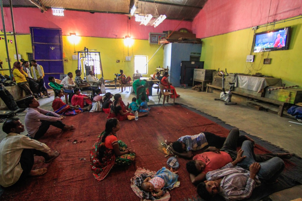 Adivasi marchers resting before the rally at the Balimela Hydro Power Project Employees Union (BHPPE) recreation centre. While the BHPPE were part of the march, another union of the same South Corporation did not join the proceedings. Reacting to their non-participation, a journalist from Jeypore said they were casteist.