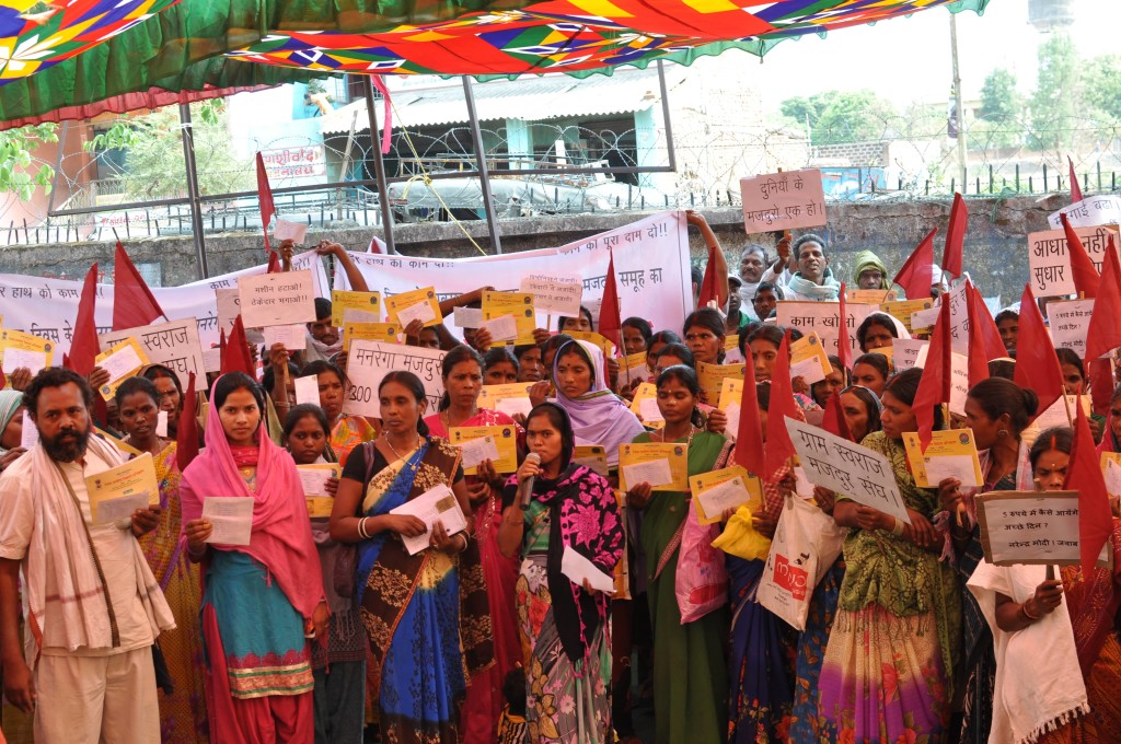 Workers holding up the letters they are sending PM Narendra Modi. Photo courtesy Jean Dreze