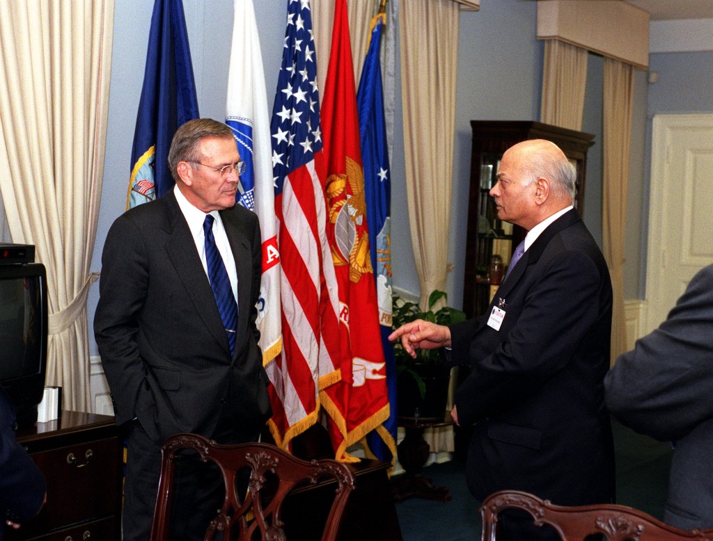 Brajesh Mishra and Donald Rumsfeld, 2001. Credit: Helene C. Stikkel