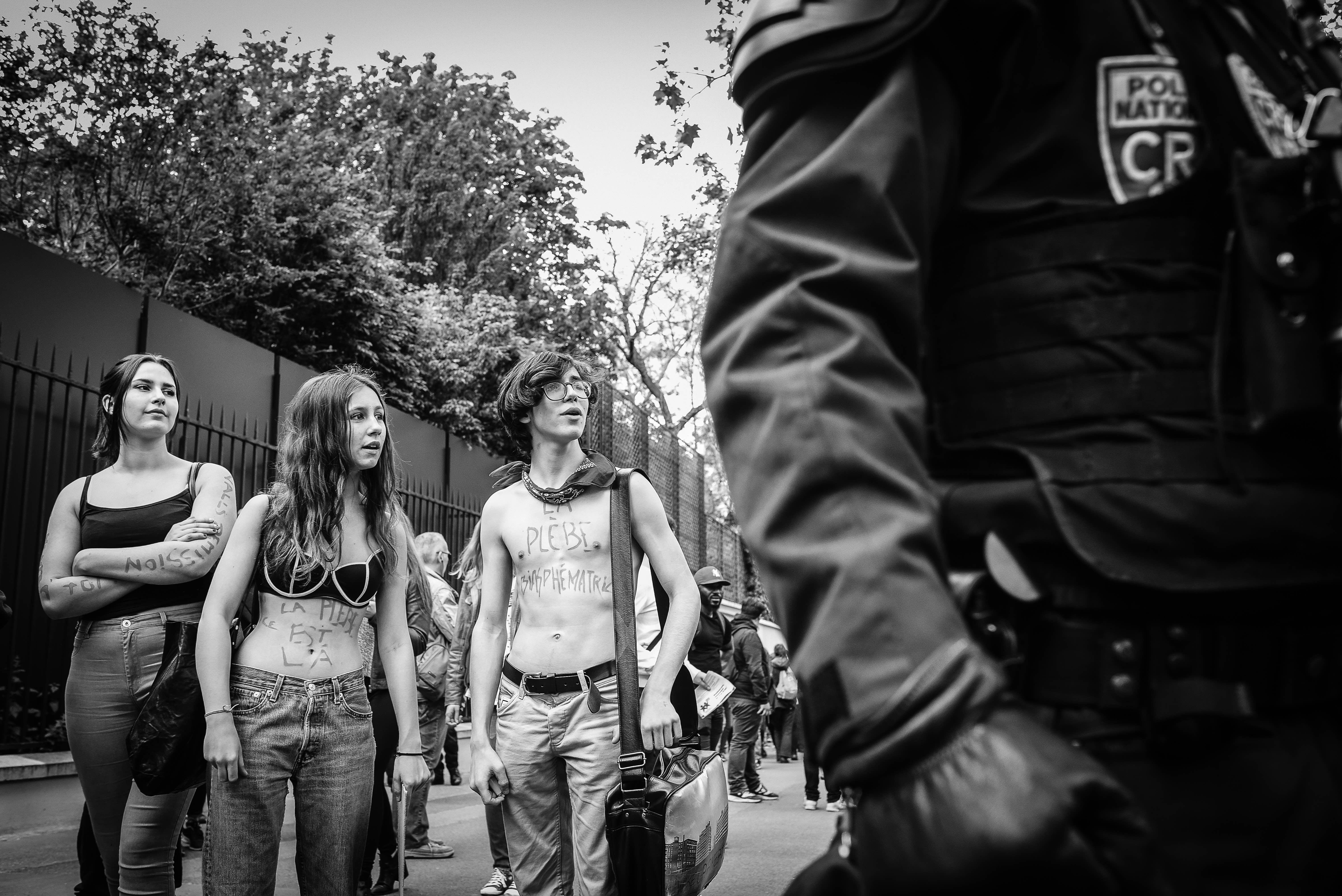 Lycéens (high school students) taking part in a demonstration against the Loi travail, Paris, 17 May 2016. The writings on their bodies describe them as blaspheming plebeians. Credit: Laurent Gayer