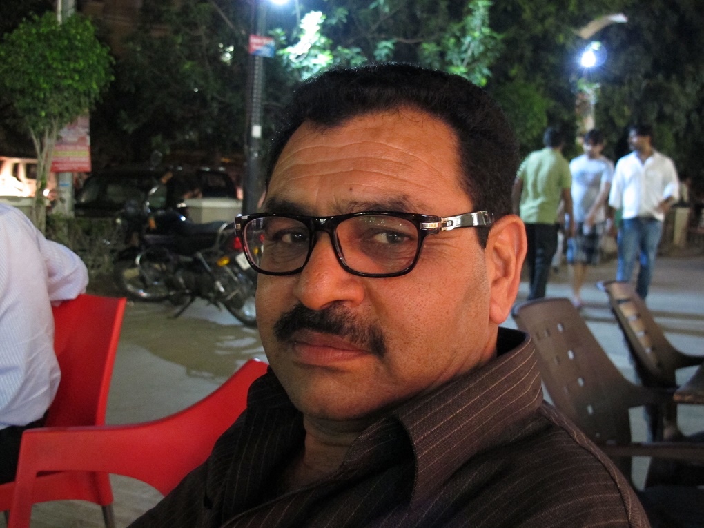 Sheikh Insram Ali, president of Mango Growers’ Association of India, said sudden weather changes mar the output of growers. Credit: Sopan Joshi