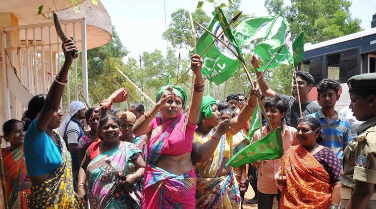 Jharkhand Mukti Morcha supporters shout slogans during a bandh called by opposition parties to protest the Jharkhand government's domicile policy, in Ranchi on Saturday. Credit: PTI