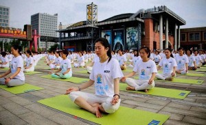 Over 3500 Yoga enthusiasts took part in one of the biggest yoga events in China ahead of International Yoga Day on June 21, in Wuxi on Sunday. Credit: PTI