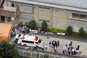 Police officers and rescue workers are seen in a facility for the disabled, where at least 19 people were killed and as many as 20 wounded by a knife-wielding man, in Sagamihara, Kanagawa prefecture, Japan, in this photo taken by Kyodo July 26, 2016. Credit: Kyodo/via Reuters
