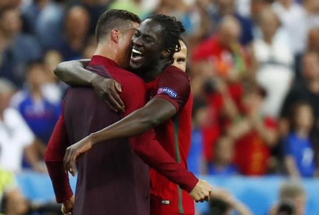 Portugal's Cristiano Ronaldo and Eder celebrate after winning Euro 2016. Credit: REUTERS/Kai Pfaffenbach