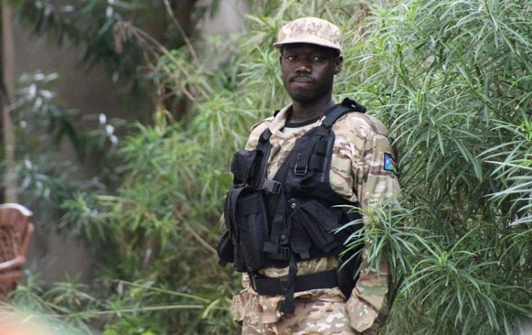 A South Sudanese policeman stands outside a compound following renewed fighting in South Sudan's capital Juba, July 10, 2016. Credit: Reuters/Stringer