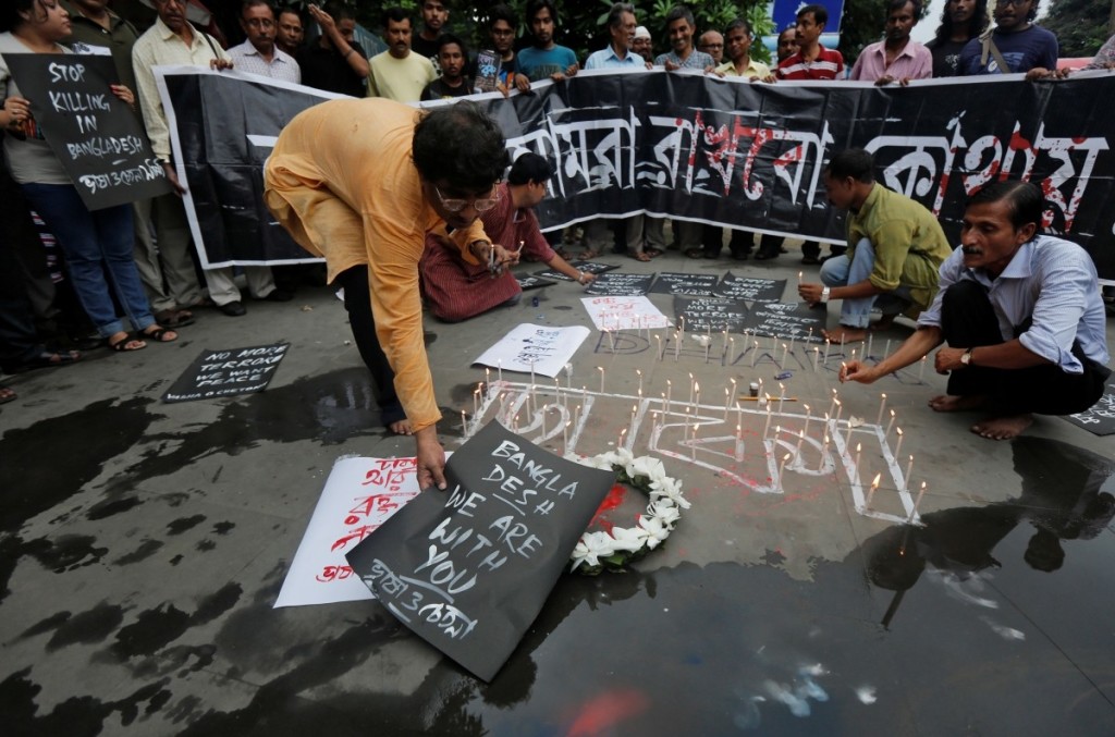 A vigil in Kolkata showing support Dhaka. Credit: Reuters