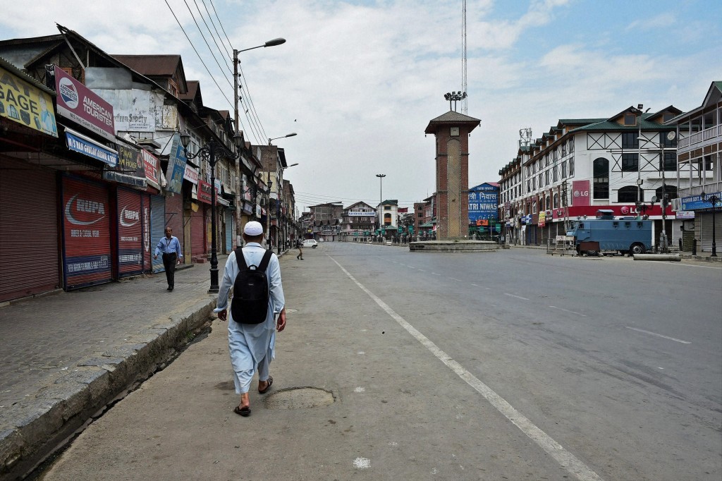 Deserted view of Lal Chowk during restrictions and strike on the fourth consecutive day in Srinagar on Tuesday. Authorities imposed restrictions in most parts of Valley following the killing of Hizbul Mujahideen commander, Burhan Muzaffar Wani, along with his two associates. Credit: PTI Photo by S Irfan