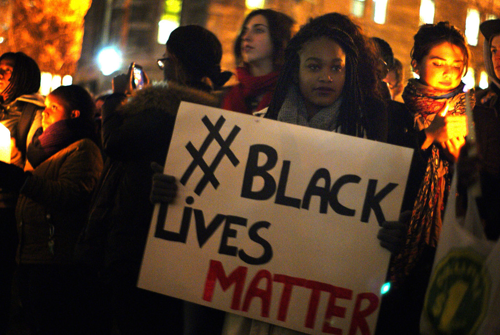 A protester at the vigil at McGill University, November 25, 2015. Credit: Gerry Lauzon/Flickr CC BY 2.0