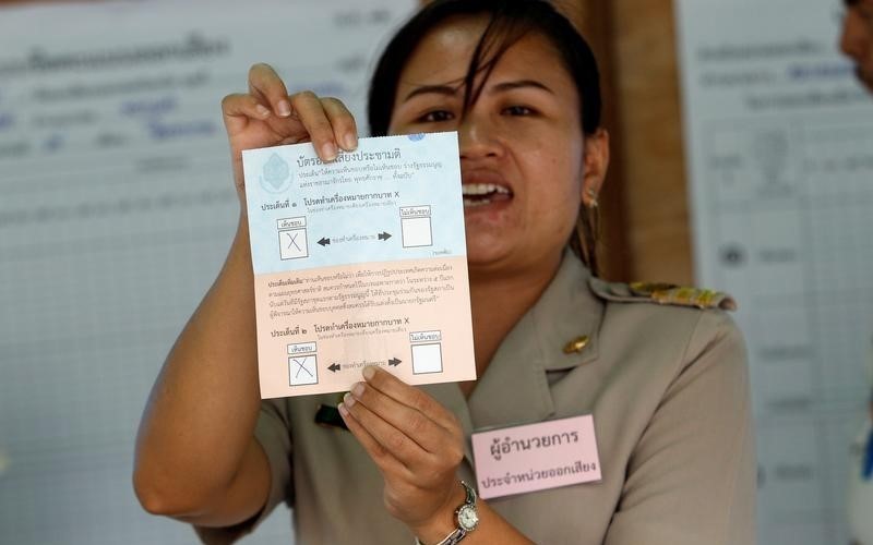 A Thai electoral worker starts counting ballots at a polling station during a constitutional referendum vote in Bangkok, Thailand August 7, 2016. Kerek Wongsa, Reuters/Files