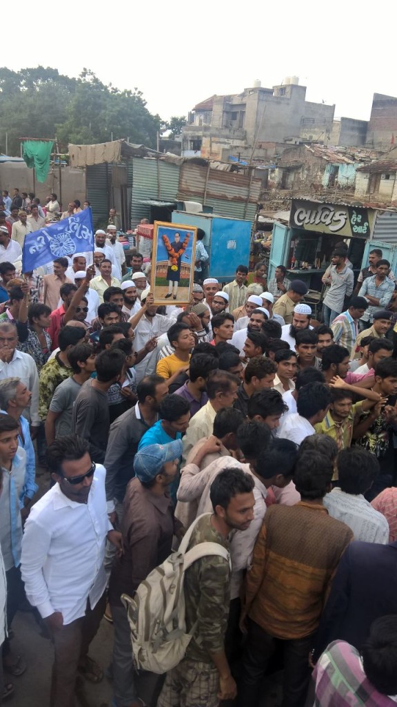 Dalits and Muslims together hold up a picture of Ambedkar in the rally, sending a powerful message. Credit: Damayantee Dhar