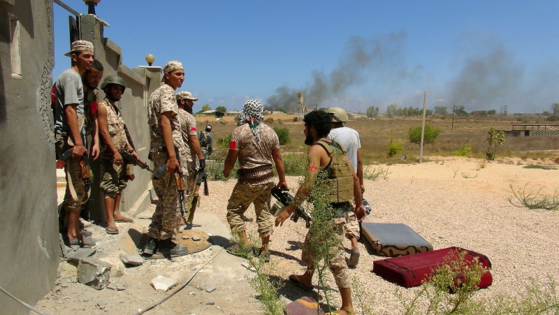 new clashes between libyan forces and isis in sirte