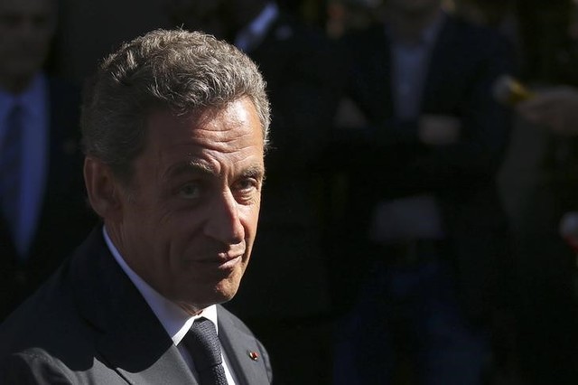 sarkozy attempts to woo voters by focusing on security and immigration