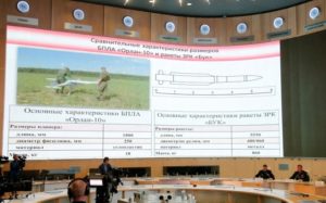 A screen shows the specifications of the 