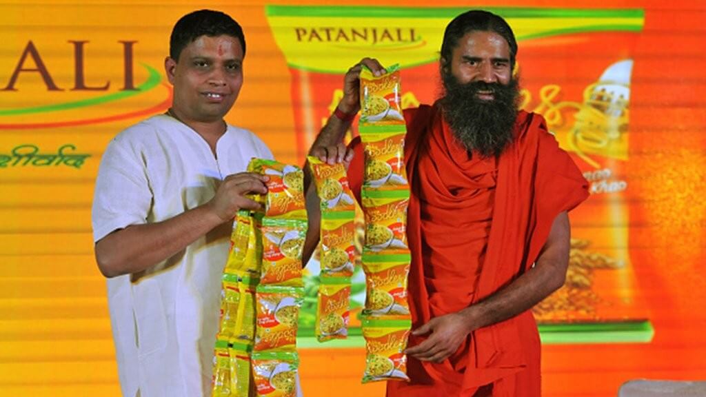 File photo of Acharya Balkrishna and Baba Ramdev of Patanjali Ayurveda. Credit: PTI