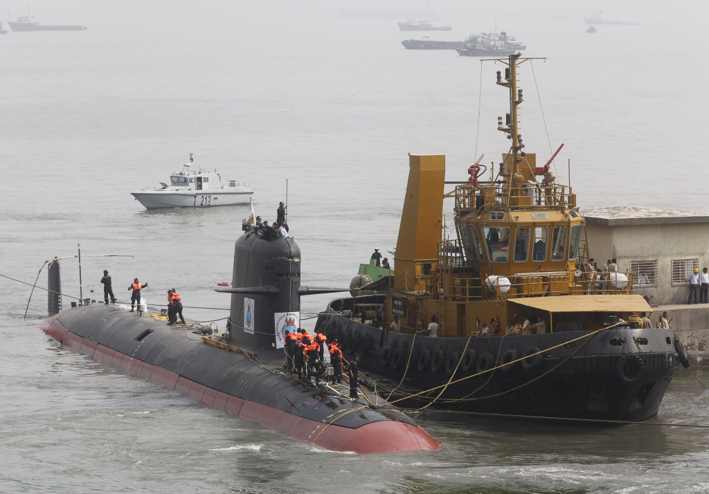 File photo of Indian Navy's Scorpene submarine INS Kalvari being escorted by tugboats as it arrives at Mazagon Docks Ltd, a naval vessel ship building yard, in Mumbai, India, October 29, 2015. REUTERS/Shailesh Andrade/Files - RTX2MRMT