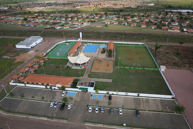 View of Nova Mutum Paraná, a development of 1,600 houses built in a deforested area far from the Madeira River, where people displaced by the Jirau hydropower plant have been resettled. The settlement has brought culture shock to the riverine population that is deeply connected with the river and the forest. Credit: Courtesy of ESBR