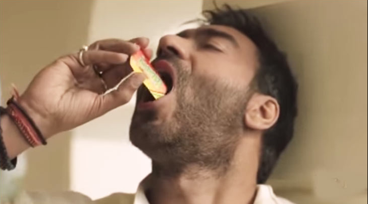 The Bollywood actor Ajay Devgn in a screen grab from an advertisement for Vimal pan masala, seen by health activists as a surrograte ad for tobacco. Credit: agencyfaqs