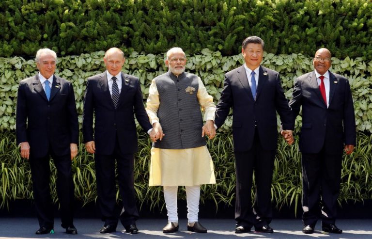(L-R) Brazil's President Michel Temer, Russian President Vladimir Putin, Indian Prime Minister Narendra Modi, Chinese President Xi Jinping and South African President Jacob Zuma pose for a group picture during BRICS (Brazil, Russia, India, China and South Africa) Summit in Benaulim, in the western state of Goa, India, October 16, 2016. Credit: Reuters/Danish Siddiqui