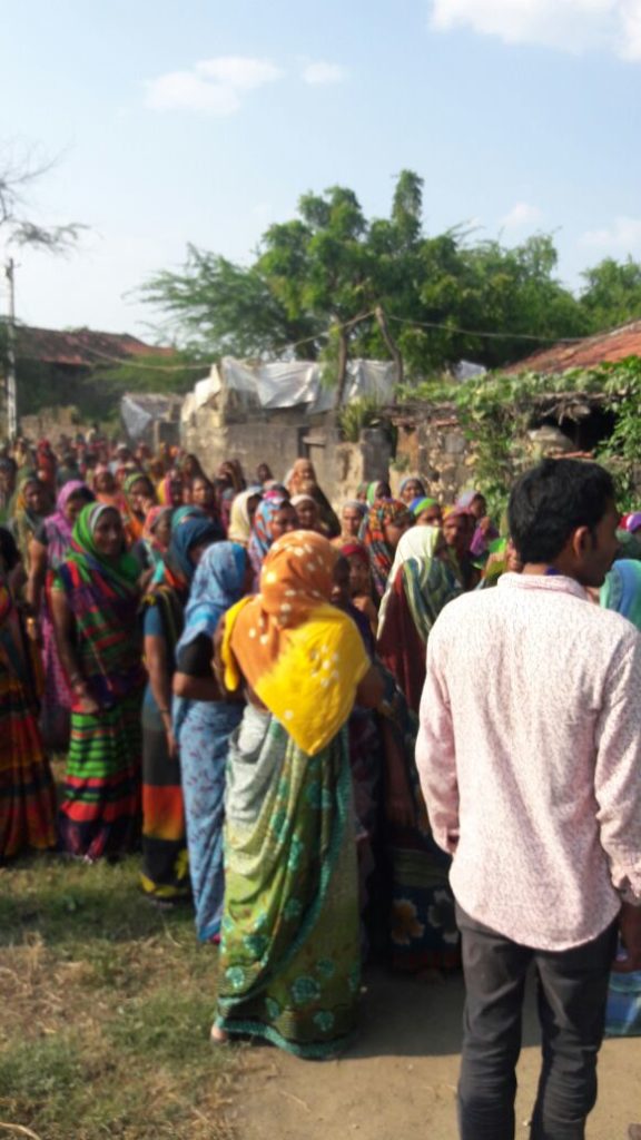 Villagers gather in front of Prabhatbhai's residence after his death. Credit: Damayantee Dhar
