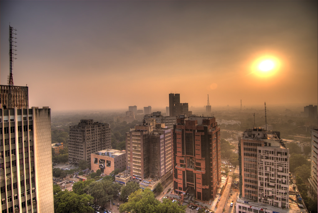 The setting sun over Connaught Place, New Delhi. Credit: wili/Flickr, CC BY 2.0