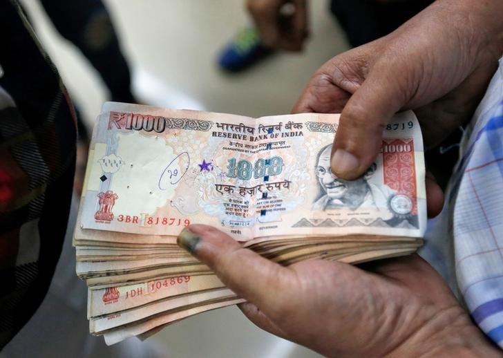 A stack of Rs 1000 notes. Credit: Reuters