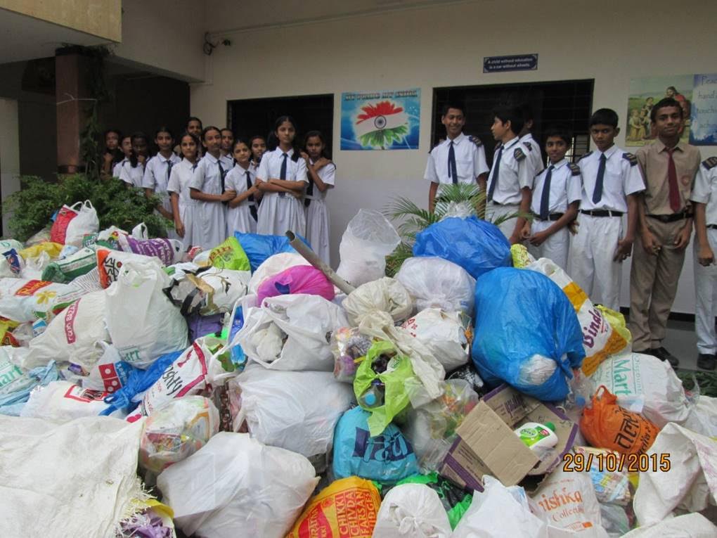 School students with plastic items they've helped collect under the Sagar-Mitra Abhiyaan programme. Credit: Scharada Dubey