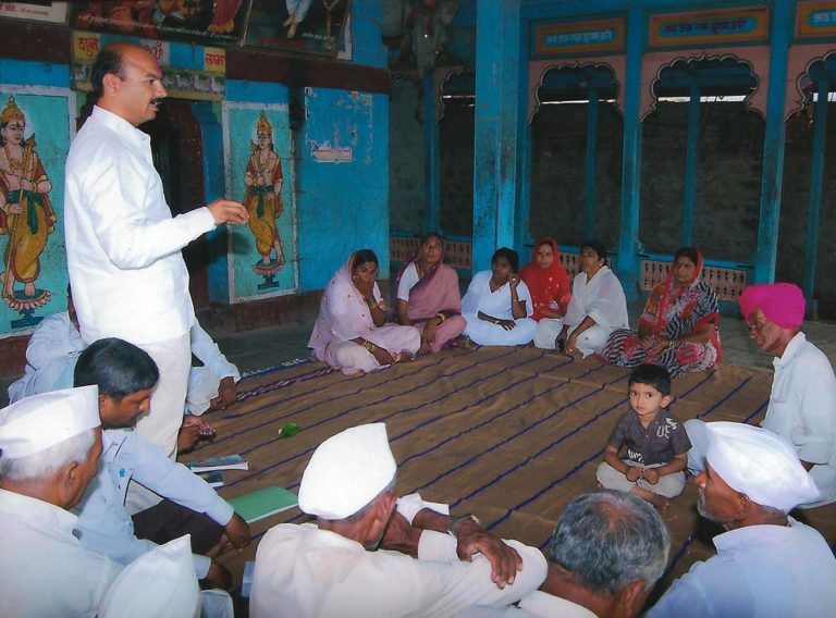 At extreme left is Shalubai, among other women at her first gram sabha meeting as sarpanch in the big Maruti temple. Credit: Wagholi gram panchayat