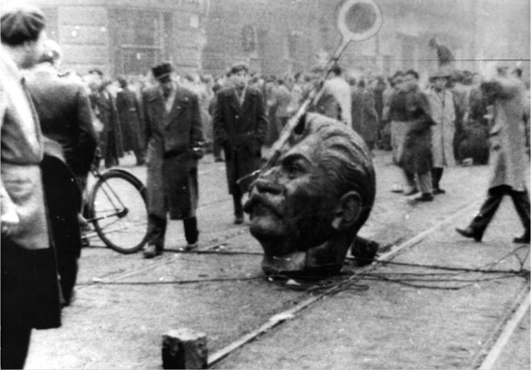 A statue of Stalin is dismantled in the Hungarian revolution of 1956. Credit: Wikimedia Commons
