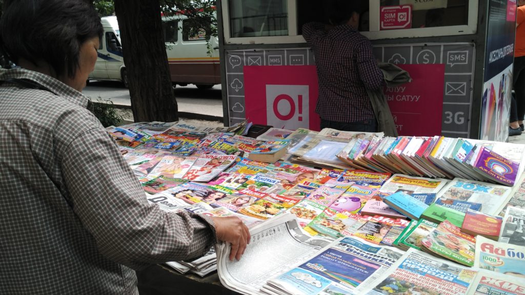 A newspaper stall in Bishkek. With more than 1,500 registered media; 125 newspapers and magazines, 26 radio and 25 TV channels Kyrgyzstan appears to have a vibrant public space. But the content is not so varied. Credit: M. Reyaz
