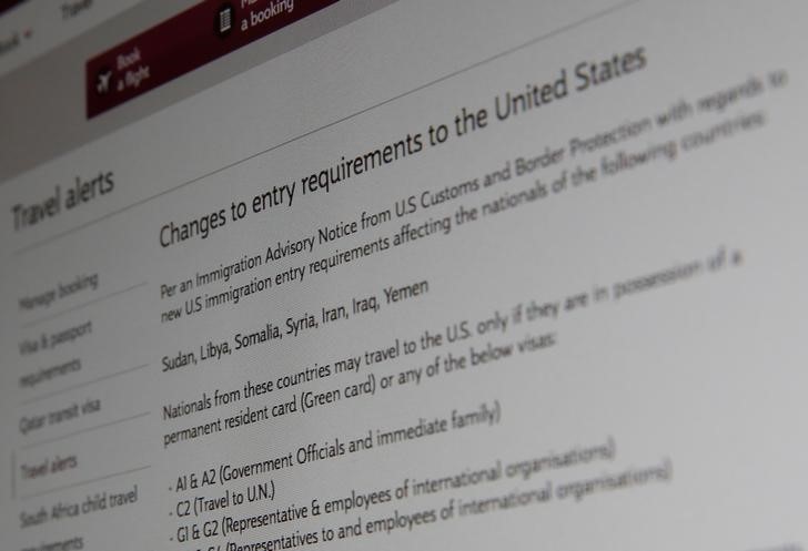 A picture of the travel advisory page of Qatar Airways advising passengers bound for the United States from seven newly banned majority Muslim countries that they need to have either a US green card or diplomatic visa, January 28, 2017 in London, Britain. Picture taken January 28, 2017. Credit: Reuters/Russell Boyce