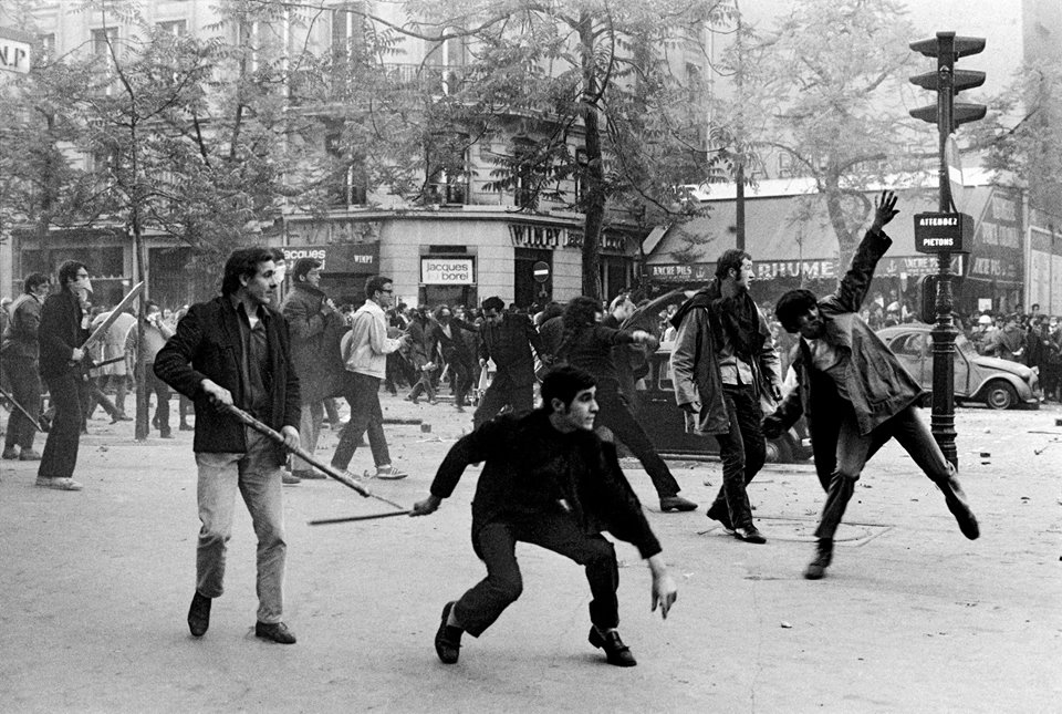 Students hurtling projectiles against the police. Boulevard Saint Germain, 6th arrondissement, Paris, France. May 6th, 1968. Credit: Magnum Photos/Facebook
