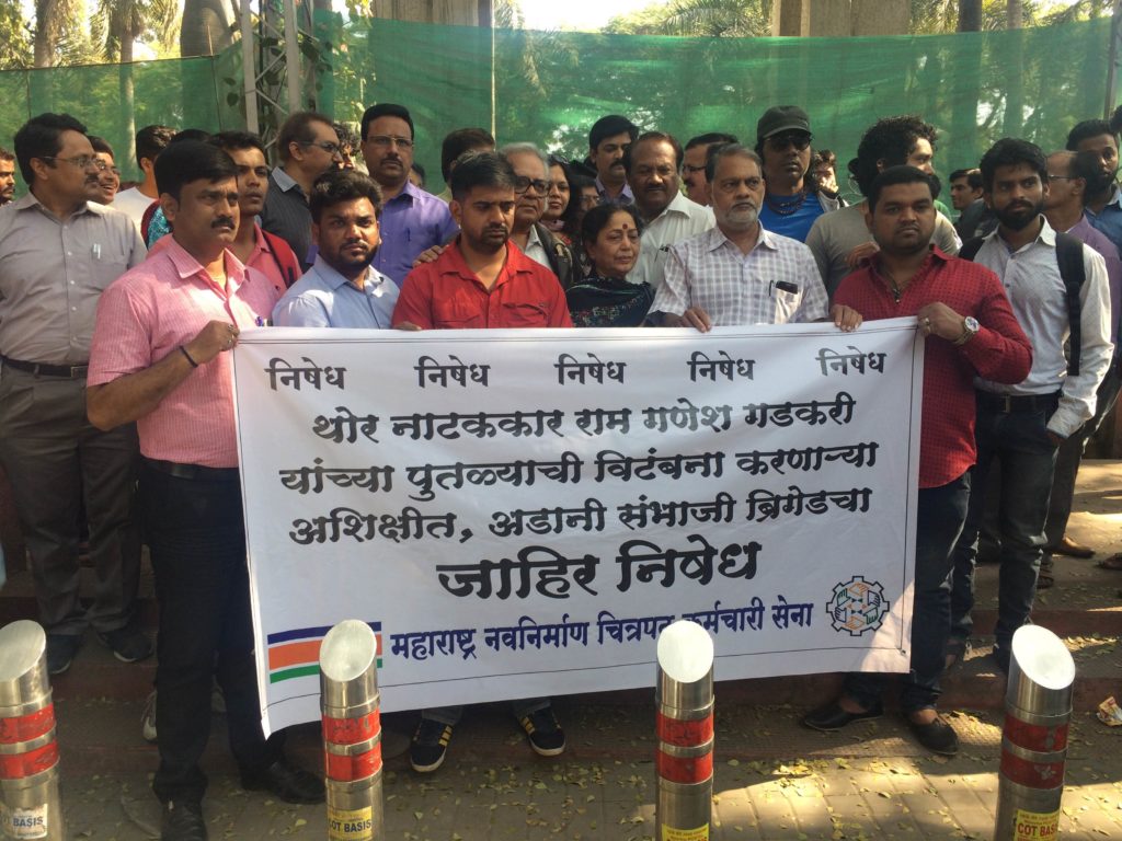 Artists and writes collected at the site after the vandalism. Credit: Varsha Torgalkar