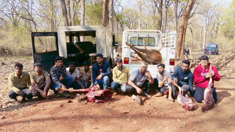 Poachers with seized Sambar carcass and vehicles from New Year’s arrest. Credit: WCS-India via Mongabay