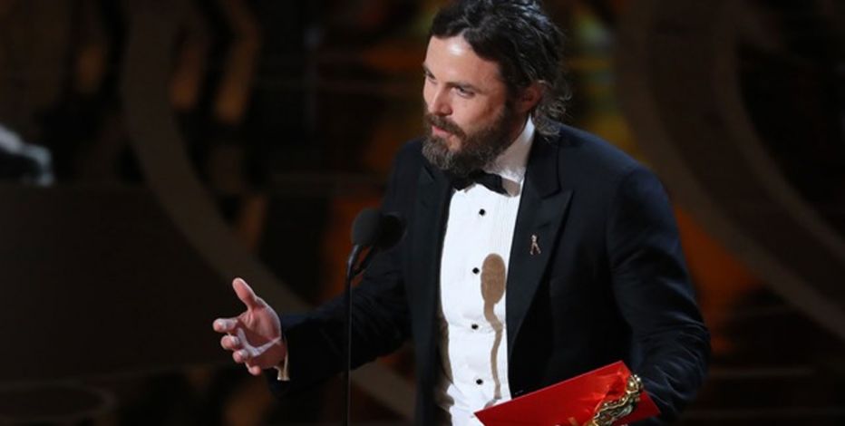 Casey Affleck accepting his Oscar for best actor. Credit: Reuters