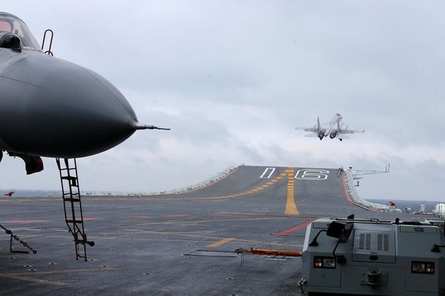 J-15 fighters from China's Liaoning aircraft carrier conduct a drill in an area of South China Sea, January 2, 2017. Credit: Reuters
