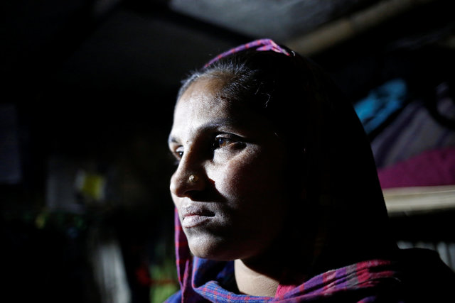 Rohingya Muslim refugee Sanmaraz, whose husband is in prison on charges of carrying ya ba, poses for a picture inside her room in the Leda Unregistered Refugee camp, in Teknaf, Bangladesh, February 15, 2017. Picture taken February 15, 2017. Credit: Reuters