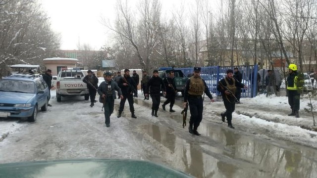 Afghan policemen keep watch at the site of a bomb blast in Kabul, Afghanistan February 7, 2017. Credit: Reuters