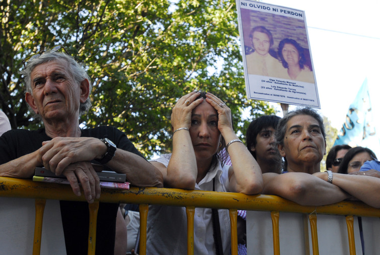 People await a verdict in the 2013 trial of former Argentinean dictator Jorge Videla. Credit: Reuters