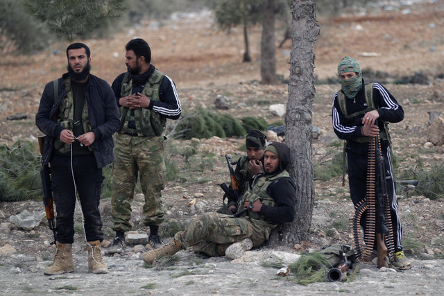 Free Syrian Army fighters rest on the outskirts of the ISIS controlled northern Syrian town of al-Bab, Syria February 4, 2017. Picture taken February 4, 2017. Credit: Reuters