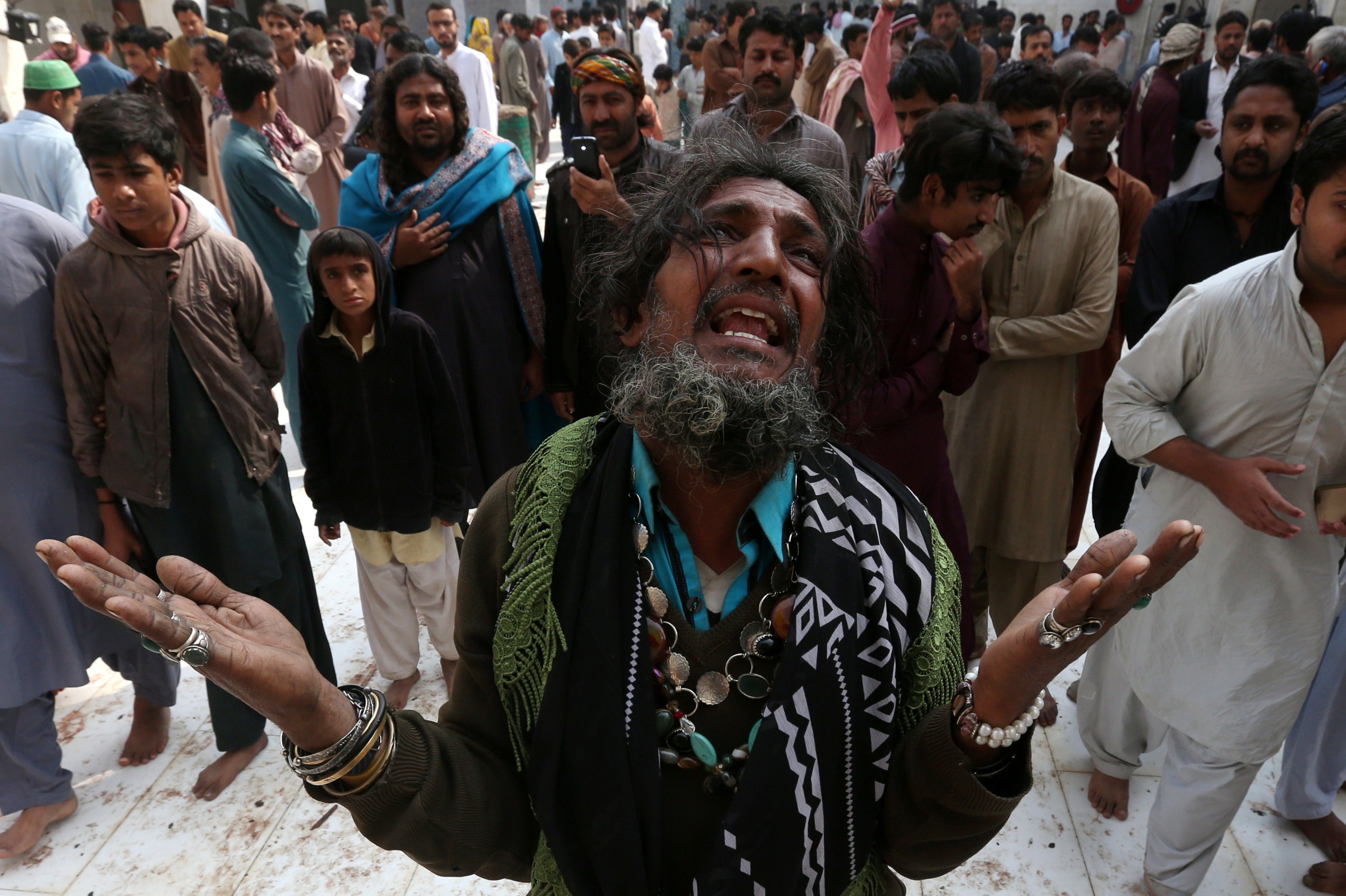 A man mourns the death of a relative who was killed in a suicide blast at the tomb of Sufi saint Syed Usman Marwandi, also known as the Lal Shahbaz Qalandar shrine, on Thursday evening in Sehwan Sharif, Pakistan's southern Sindh province, February 17, 2017. Credit: REUTERS/Akhtar Soomro