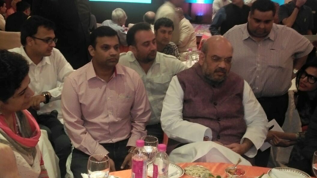 Dainik Jagran executive Tanmay Shankar and BJP president Amit Shah at the Vikas Parv event organised by the BJP to celebrate two years in power. New Delhi, May 2016. Credit: Tanmay Shankar's Facebook page.