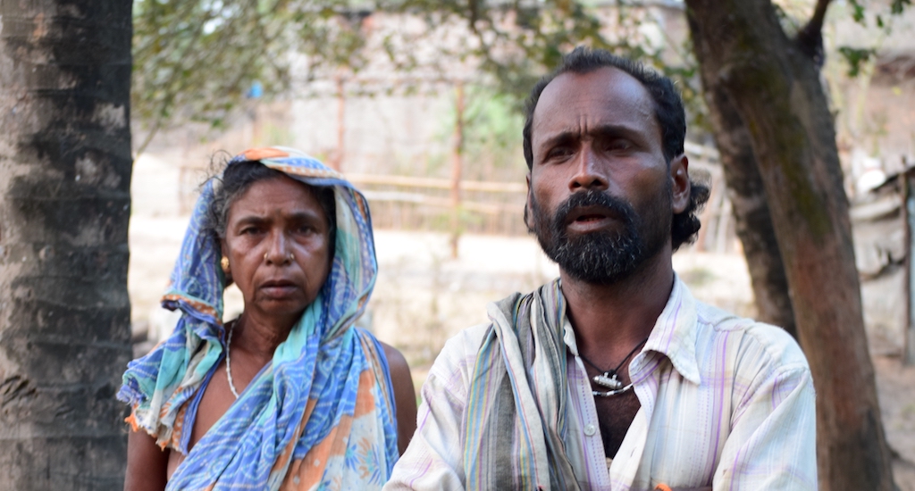 An anguished Gouri Das, seen here with her son Ranjan Das, has lost her land to the now-abandoned steel project. Credit: Basudev Mahapatra/Village Square