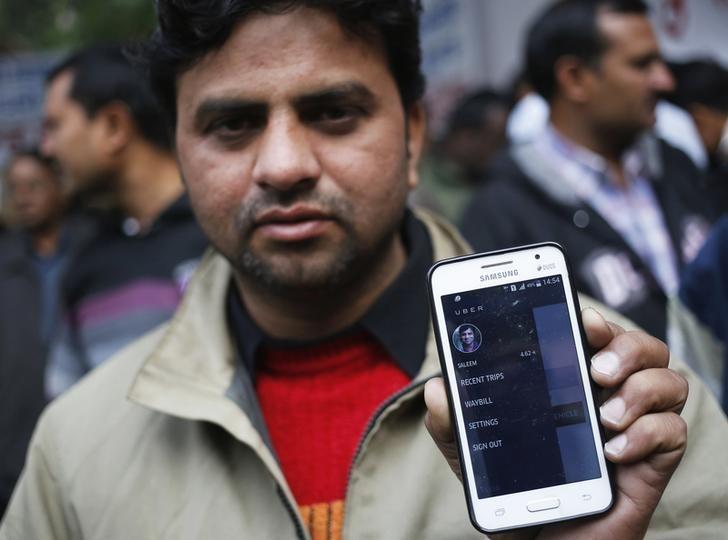 Uber and Ola drivers find themselves in no-mans land, with very little methods of grievance redressal. Credit: Reuters